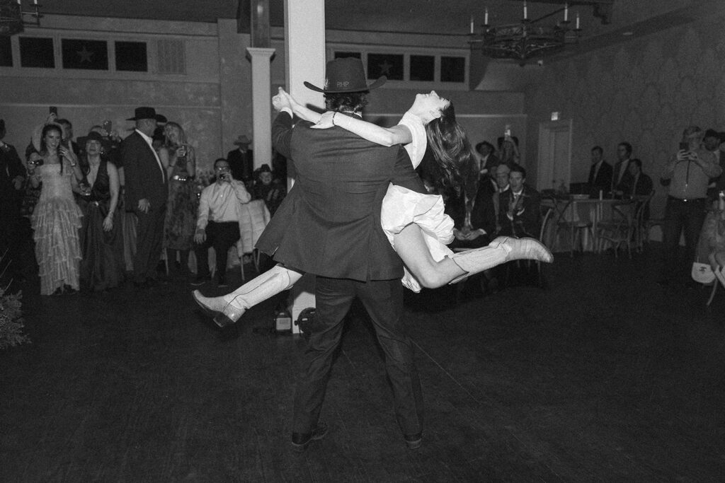 Bride and groom dancing at their Gage Hotel wedding reception in Marathon, Texas.